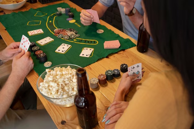 Mobile phone screen showing disinitoto live-dealer roulette table with dealer and betting interface